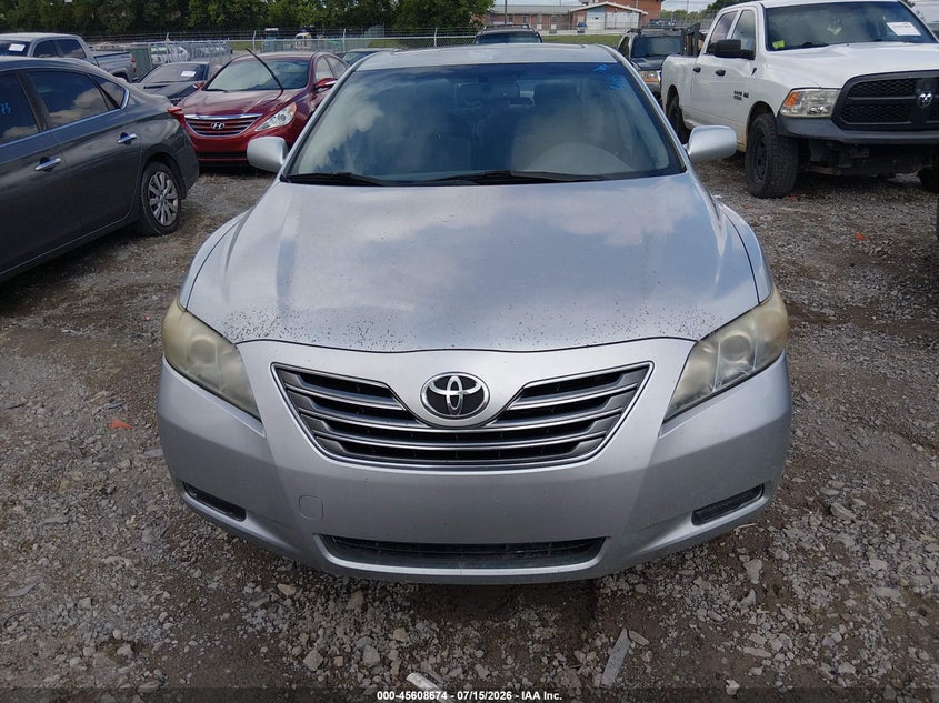 2007 Toyota Camry VIN JTNBB46K573031168 IAAI salvage auction — NORMAL WEAR, Clear, sold $25 on 2026-07-23 (photo 6)