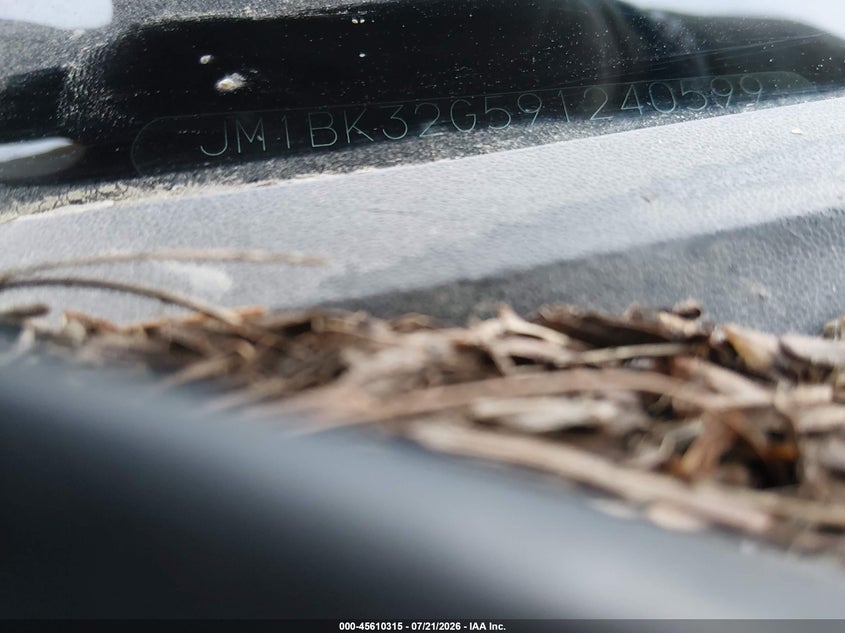 2009 Mazda 3 VIN JM1BK32G591240599 IAAI salvage auction — NORMAL WEAR, Original (Maine), sold $25 on 2026-07-27 (photo 9)