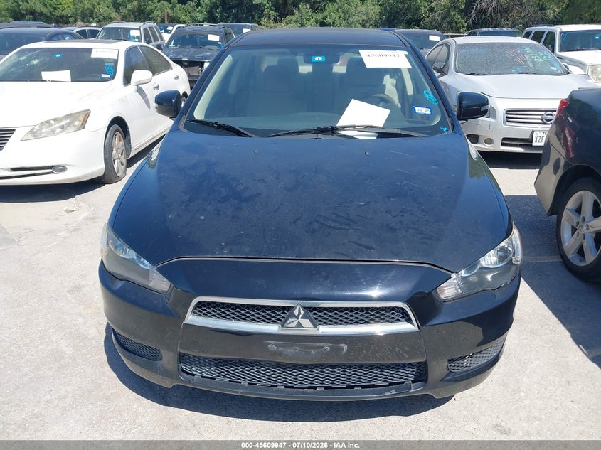 2015 Mitsubishi Lancer VIN JA32U2FU8FU017549 IAAI salvage auction — NORMAL WEAR, Salvage Title, sold $450 on 2026-07-27 (photo 6)