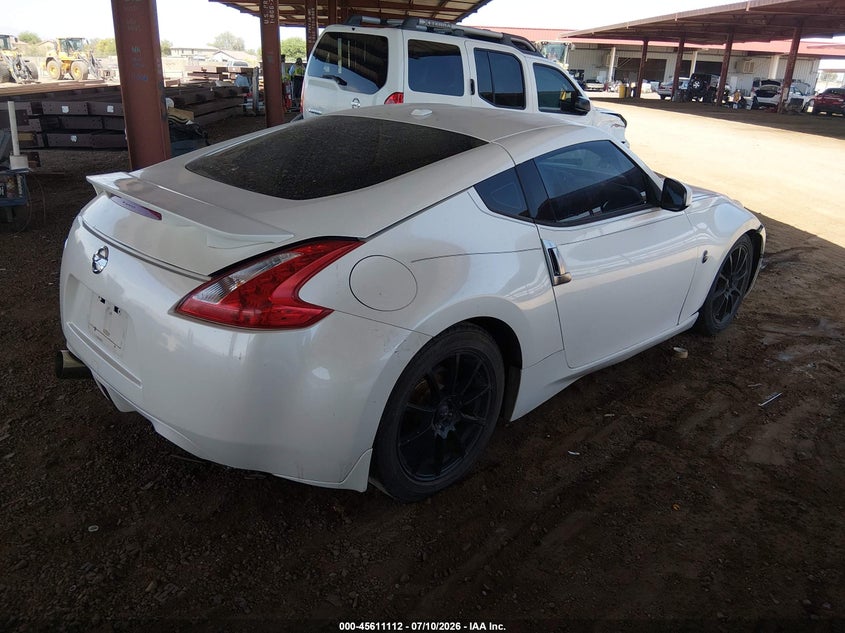 2009 Nissan 370z VIN JN1AZ44E79M406308 IAAI salvage auction — NORMAL WEAR, Restored (Arizona), sold $2,275 on 2026-07-28 (photo 4)