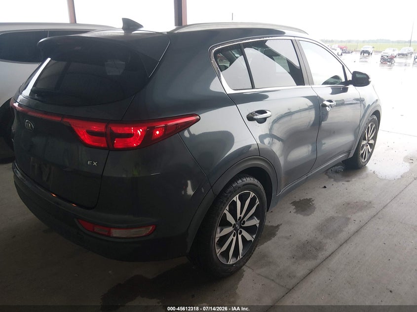 2017 Kia Sportage VIN KNDPN3AC8H7137054 IAAI salvage auction — NORMAL WEAR, Original (Texas), sold $3,450 on 2026-07-17 (photo 4)