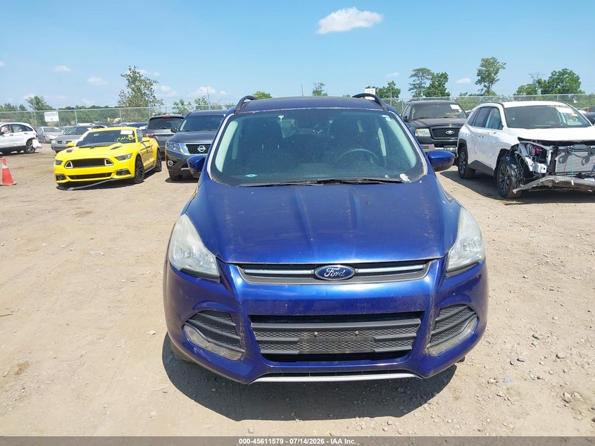 2016 Ford Escape VIN 1FMCU9GX6GUB69060 IAAI salvage auction — NORMAL WEAR, Salvage Title, sold $675 on 2026-08-01 (photo 6)