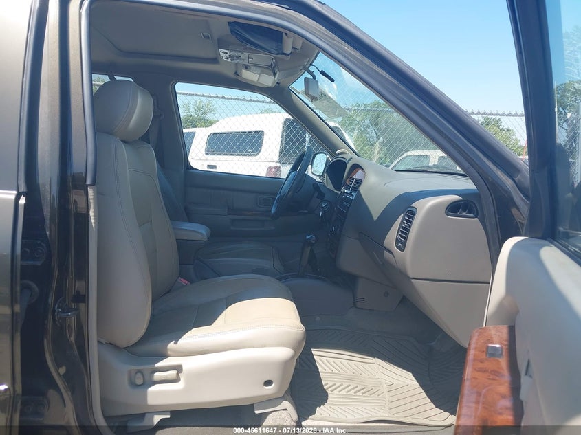 1999 Infiniti Qx4 VIN JNRAR05Y3XW041853 IAAI salvage auction — NORMAL WEAR, Regular Certificate (Iowa), sold $450 on 2026-07-21 (photo 5)
