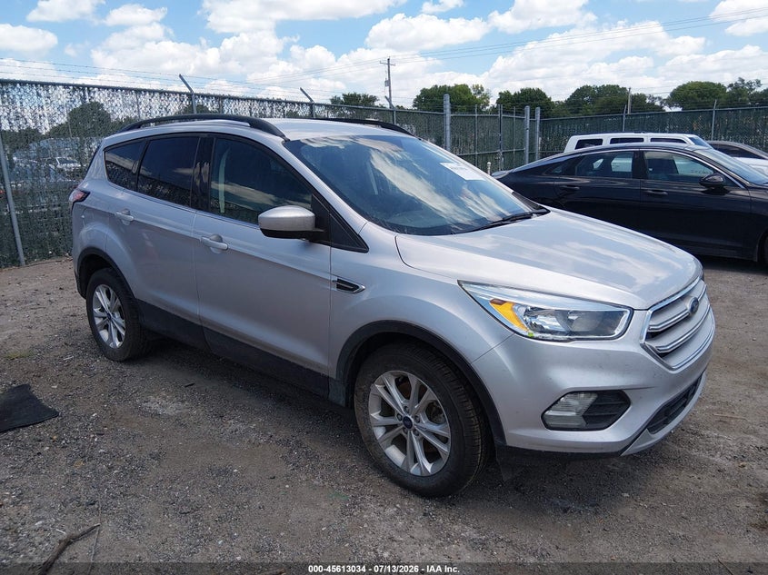 2018 Ford Escape VIN 1FMCU9GD4JUD29076 IAAI salvage auction — NORMAL WEAR, Clear (Kansas), sold $1,400 on 2026-07-18 (photo 1)