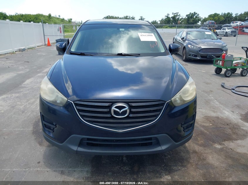 2016 Mazda Cx-5 VIN JM3KE2BY7G0672244 IAAI salvage auction — NORMAL WEAR, Clear (Florida), sold $1,700 on 2026-07-29 (photo 6)