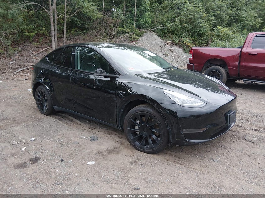 2023 Tesla Model y VIN 7SAYGDEE4PA050972 IAAI salvage auction — RIGHT FRONT, Wait Title, sold $11,700 on 2026-09-01 (photo 1)