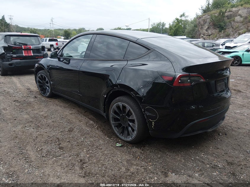 2023 Tesla Model y VIN 7SAYGDEE4PA050972 IAAI salvage auction — RIGHT FRONT, Wait Title, sold $11,700 on 2026-09-01 (photo 3)
