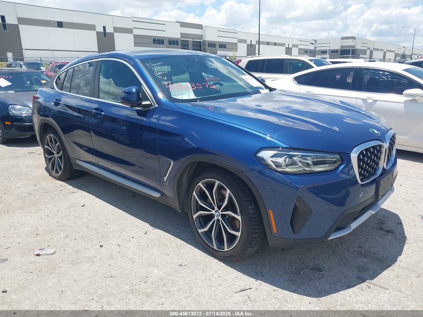 2023 BMW X4 VIN 5UX33DT05P9R33310 — IAAI salvage auction photo