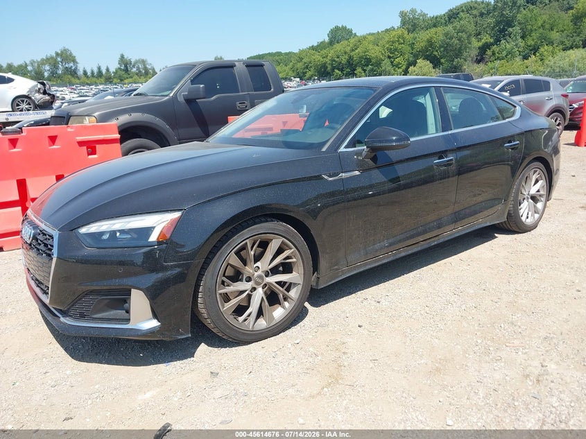 2021 Audi A5 VIN WAUCBCF56MA004613 IAAI salvage auction — RIGHT SIDE, Wait Title, sold $12,900 on 2026-09-26 (photo 2)