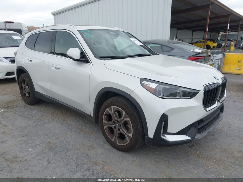 2023 BMW X1 VIN WBX73EF04P5W14737 IAAI salvage auction — LEFT SIDE, Salvage Title, sold $12,200 on 2026-07-30 (photo 1)