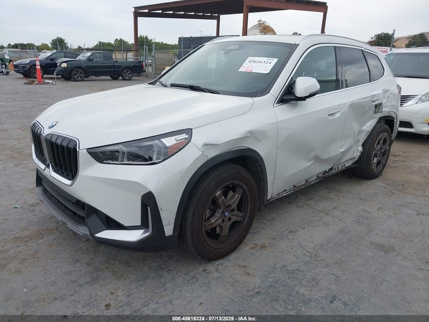 2023 BMW X1 VIN WBX73EF04P5W14737 IAAI salvage auction — LEFT SIDE, Salvage Title, sold $12,200 on 2026-07-30 (photo 2)