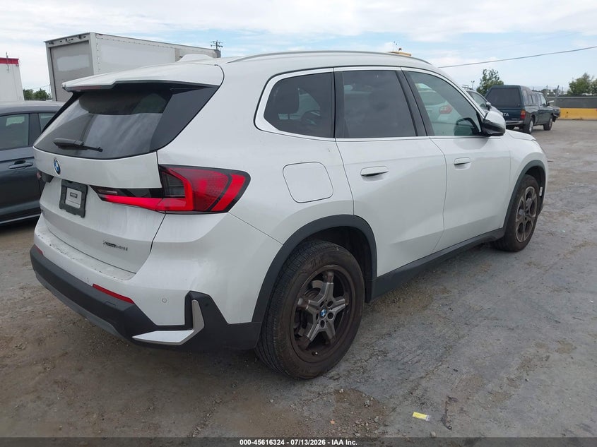 2023 BMW X1 VIN WBX73EF04P5W14737 IAAI salvage auction — LEFT SIDE, Salvage Title, sold $12,200 on 2026-07-30 (photo 4)
