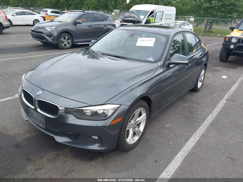 2014 BMW 3er VIN WBA3B5C56EP542548 IAAI salvage auction — WATER/FLOOD, Salvage (Idaho), sold $2,600 on 2026-08-03 (photo 2)