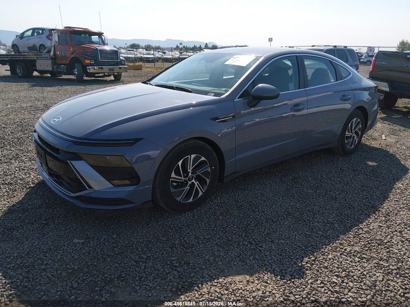 2026 Hyundai Sonata hybrid VIN KMHL24JJ2TA172045 IAAI salvage auction — REAR END, Enterprise Vehicles Clear Only (California), sold $10,900 on 2026-07-29 (photo 2)