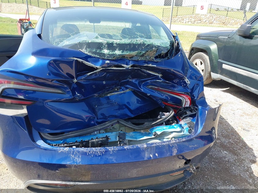 2025 Tesla Model 3 VIN 5YJ3E1EA9SF912250 IAAI salvage auction — REAR END, Salvage (Texas), sold $12,950 on 2026-09-07 (photo 6)