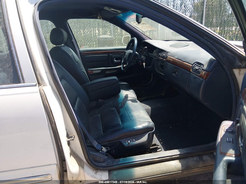 1999 Cadillac Deville VIN 1G6KD54Y9XU720994 IAAI salvage auction — NORMAL WEAR, Clear (Kansas), sold $250 on 2026-07-31 (photo 5)