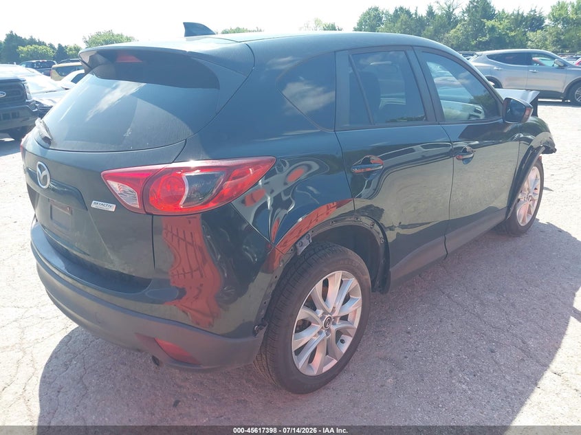2014 Mazda Cx-5 VIN JM3KE2DYXE0317241 IAAI salvage auction — NORMAL WEAR, Clear - Public Restricted (Oklahoma), sold $625 on 2026-07-29 (photo 4)