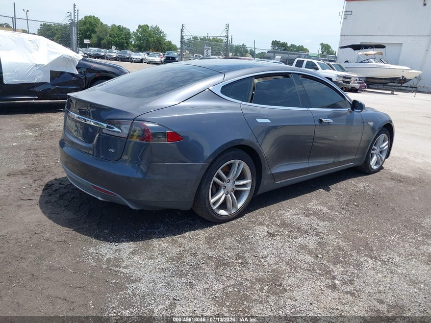 2014 Tesla Model s VIN 5YJSA1S10EFP56681 IAAI salvage auction — MECHANICAL, Clear (Florida), sold $75 on 2026-07-19 (photo 4)