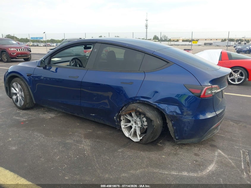 2023 Tesla Model y VIN 7SAYGDEE0PA206991 IAAI salvage auction — LEFT SIDE, Salvage Title, sold $11,250 on 2026-09-05 (photo 3)