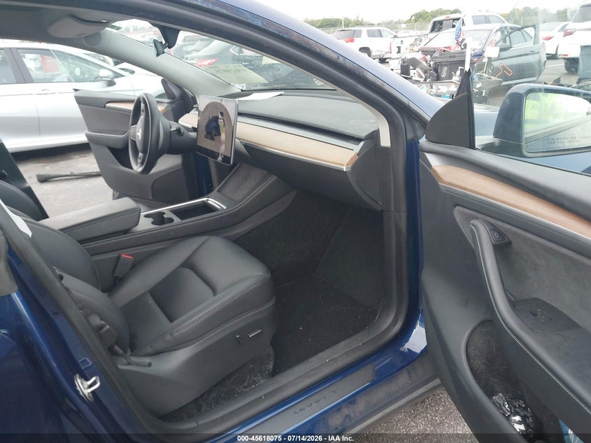 2023 Tesla Model y VIN 7SAYGDEE0PA206991 IAAI salvage auction — LEFT SIDE, Salvage Title, sold $11,250 on 2026-09-05 (photo 5)