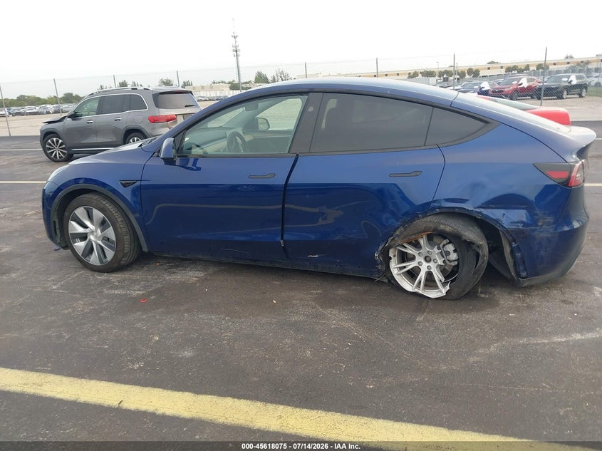 2023 Tesla Model y VIN 7SAYGDEE0PA206991 IAAI salvage auction — LEFT SIDE, Salvage Title, sold $11,250 on 2026-09-05 (photo 6)