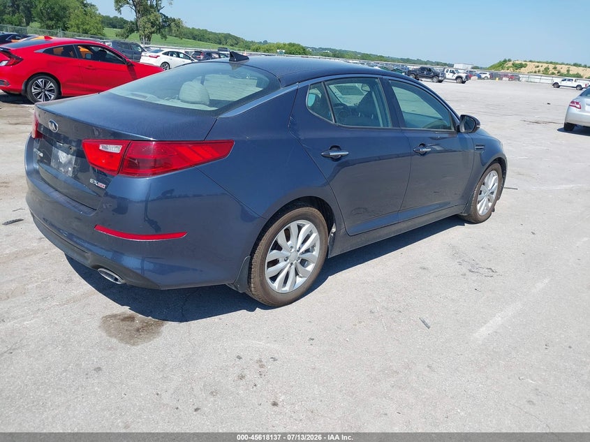 2015 Kia Optima VIN 5XXGN4A77FG366936 IAAI salvage auction — NORMAL WEAR, Regular Certificate (Iowa), sold $1,300 on 2026-07-28 (photo 4)