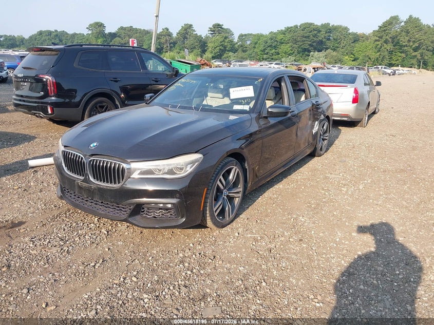2016 BMW 7er VIN WBA7F2C55GG416043 IAAI salvage auction — LEFT SIDE, Salvage Title, sold $6,800 on 2026-08-18 (photo 2)