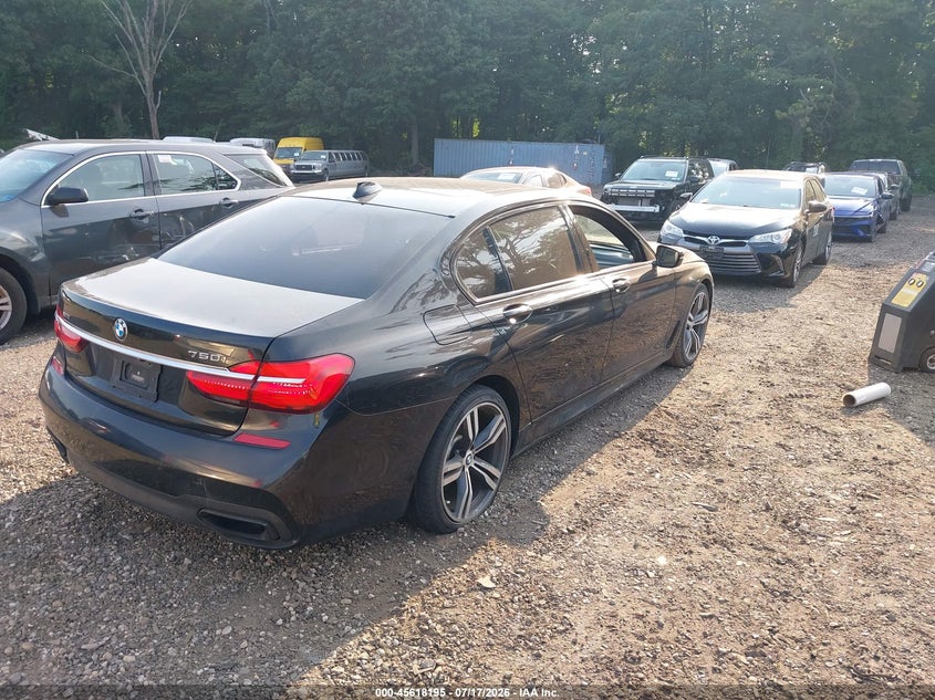 2016 BMW 7er VIN WBA7F2C55GG416043 IAAI salvage auction — LEFT SIDE, Salvage Title, sold $6,800 on 2026-08-18 (photo 4)