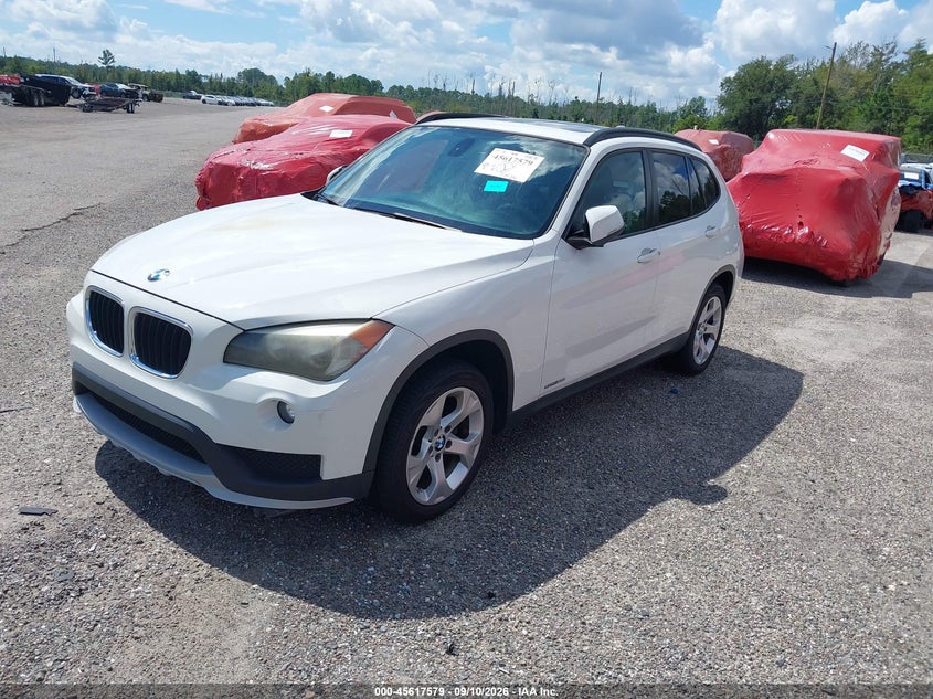 2015 BMW X1 VIN WBAVM1C53FVW57696 IAAI salvage auction — Burn Engine, Rebuildable (Florida), sold $250 on 2026-09-26 (photo 2)