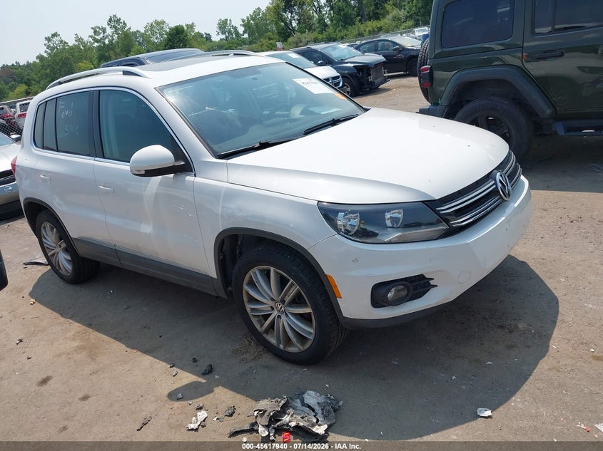 2012 Volkswagen Tiguan VIN WVGBV7AX7CW509580 IAAI salvage auction — LEFT SIDE, Salvage (Ohio), sold $775 on 2026-08-04 (photo 1)