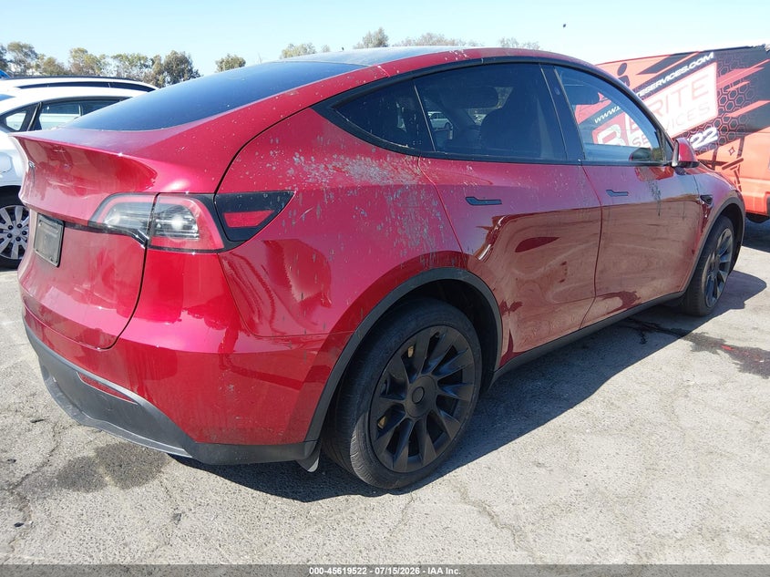 2024 Tesla Model y VIN 7SAYGDED8RF100897 IAAI salvage auction — Burn Interior, Salvage (California), sold $6,900 on 2026-07-30 (photo 4)