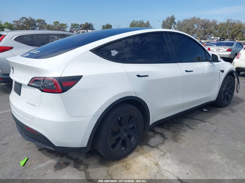 2023 Tesla Model y VIN 7SAYGDEE5PA185278 IAAI salvage auction — NORMAL WEAR, Salvage (California), sold $325 on 2026-07-30 (photo 4)