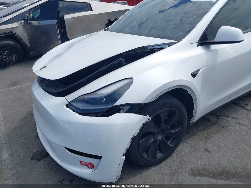 2023 Tesla Model y VIN 7SAYGDEE5PA185278 IAAI salvage auction — NORMAL WEAR, Salvage (California), sold $325 on 2026-07-30 (photo 6)