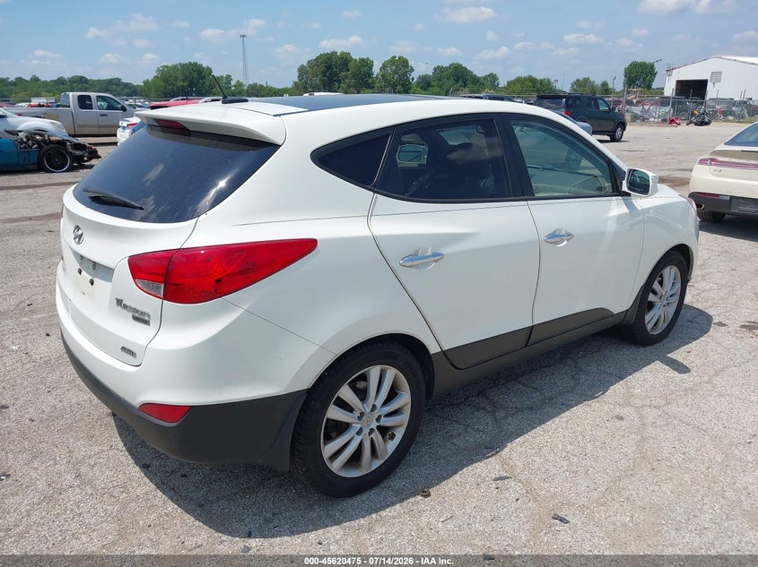 2011 Hyundai Tucson VIN KM8JUCAC5BU176231 IAAI salvage auction — NORMAL WEAR, Clear (Illinois), sold $1,775 on 2026-07-22 (photo 4)