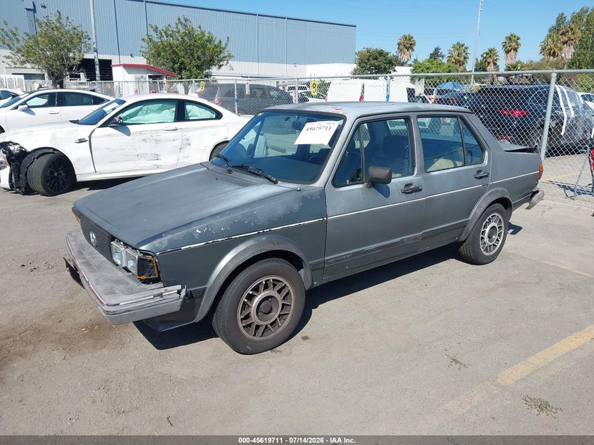 1984 Volkswagen Jetta VIN WVWGB0160EW133891 IAAI salvage auction — FRONT & REAR, Salvage (California), sold $150 on 2026-08-10 (photo 2)