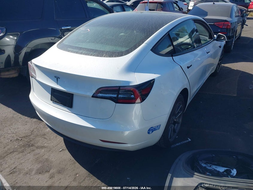 2021 Tesla Model 3 VIN 5YJ3E1EA9MF929701 IAAI salvage auction — LEFT FRONT, Wait Title, sold $5,800 on 2026-08-21 (photo 4)