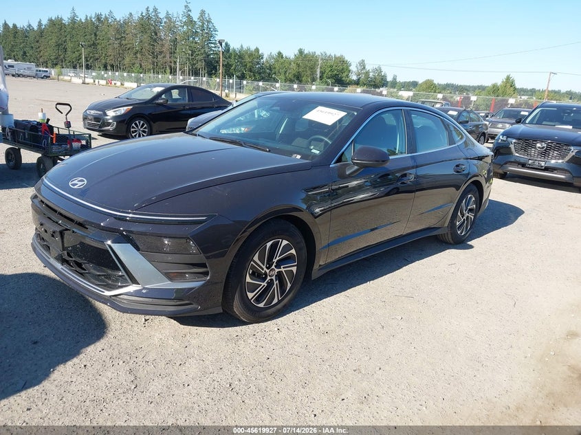 2026 Hyundai Sonata hybrid VIN KMHL24JJ7TA162188 IAAI salvage auction — RIGHT SIDE, Enterprise Vehicles Clear Only (Washington), sold $16,700 on 2026-07-15 (photo 2)