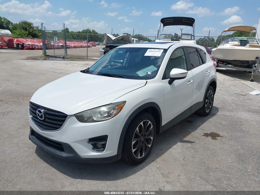2016 Mazda Cx-5 VIN JM3KE4DY2G0713257 IAAI salvage auction — SIDE, Salvage (Idaho), sold $3,300 on 2026-09-02 (photo 2)