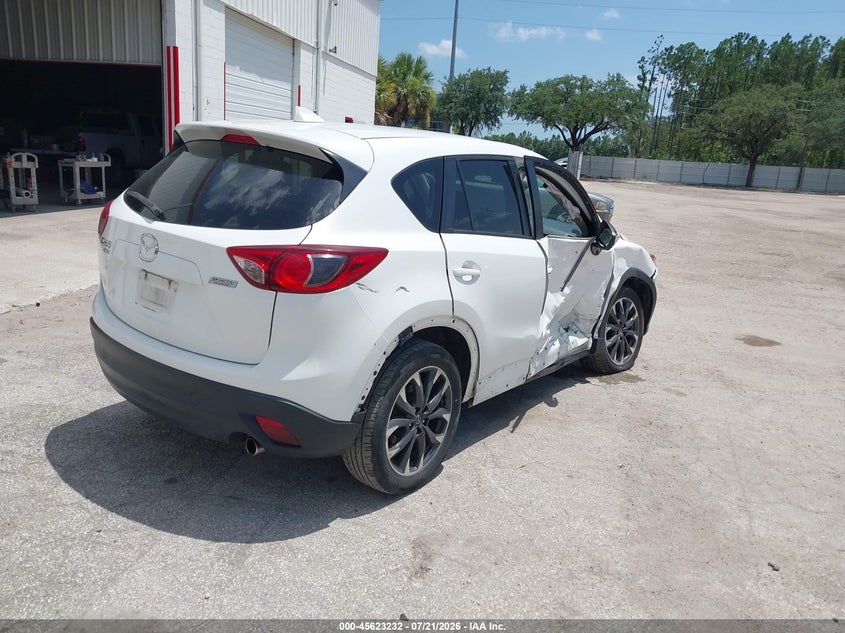 2016 Mazda Cx-5 VIN JM3KE4DY2G0713257 IAAI salvage auction — SIDE, Salvage (Idaho), sold $3,300 on 2026-09-02 (photo 4)