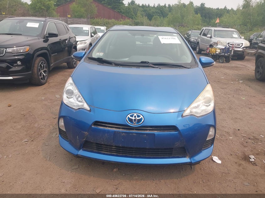 2012 Toyota Prius c VIN JTDKDTB3XC1519464 IAAI salvage auction — NORMAL WEAR, Salvage Title, sold $525 on 2026-07-17 (photo 6)