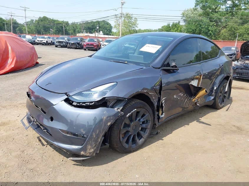 2023 Tesla Model y VIN 7SAYGDEE4PF861741 IAAI salvage auction — SIDE, Salvage (Idaho), sold $10,200 on 2026-08-02 (photo 6)