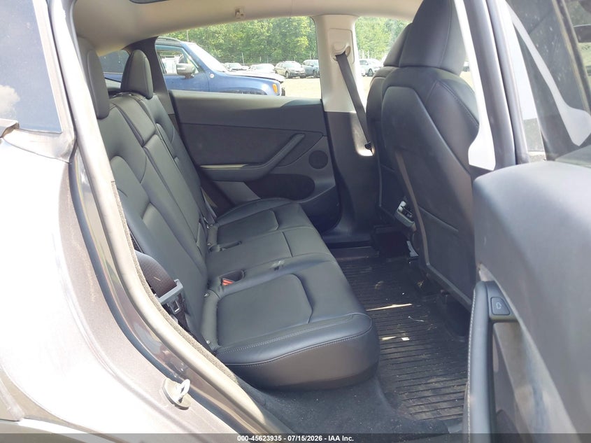 2023 Tesla Model y VIN 7SAYGDEE4PF861741 IAAI salvage auction — SIDE, Salvage (Idaho), sold $10,200 on 2026-08-02 (photo 8)