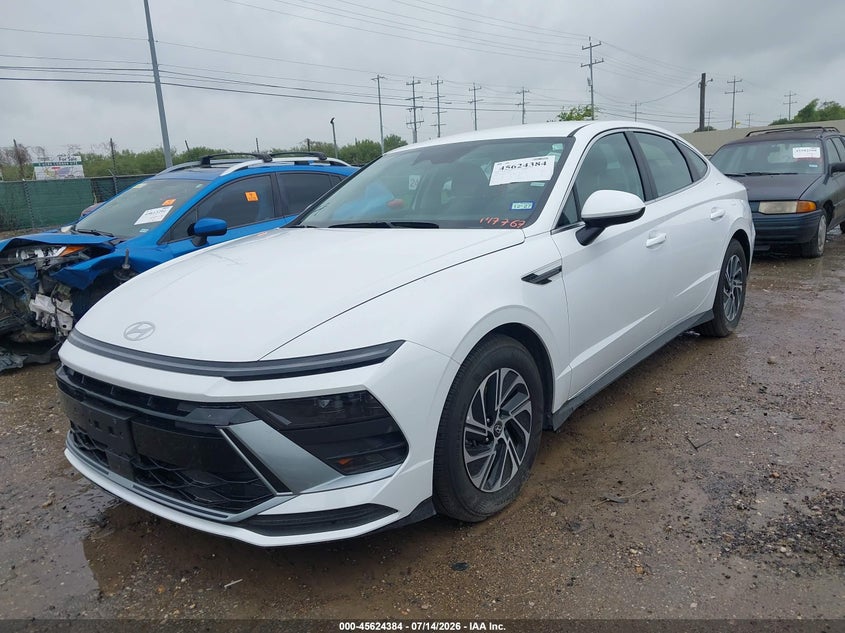 2026 Hyundai Sonata hybrid VIN KMHL24JJ3TA147767 IAAI salvage auction — ENGINE DAMAGE, Enterprise Vehicles Clear Only (Texas), sold $17,900 on 2026-07-20 (photo 2)