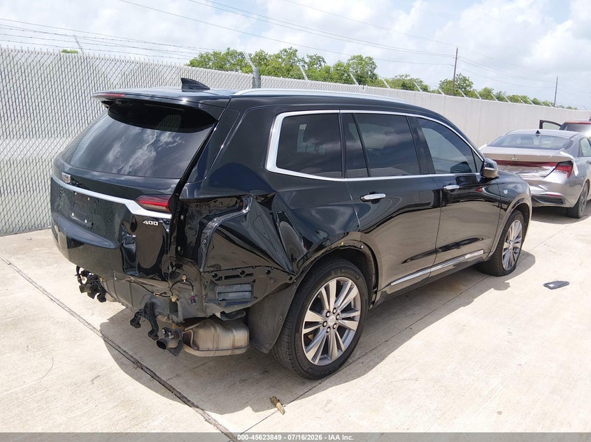 2023 Cadillac Xt6 VIN 1GYKPCRS6PZ213724 IAAI salvage auction — REAR END, Original (Texas), sold $25 on 2026-08-19 (photo 4)