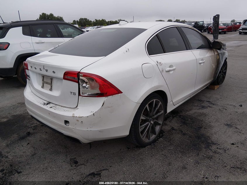 2015 Volvo S60 VIN YV140MFB0F1300622 IAAI salvage auction — ENGINE BURN, Non-Repairable (Texas), sold $100 on 2026-08-20 (photo 4)