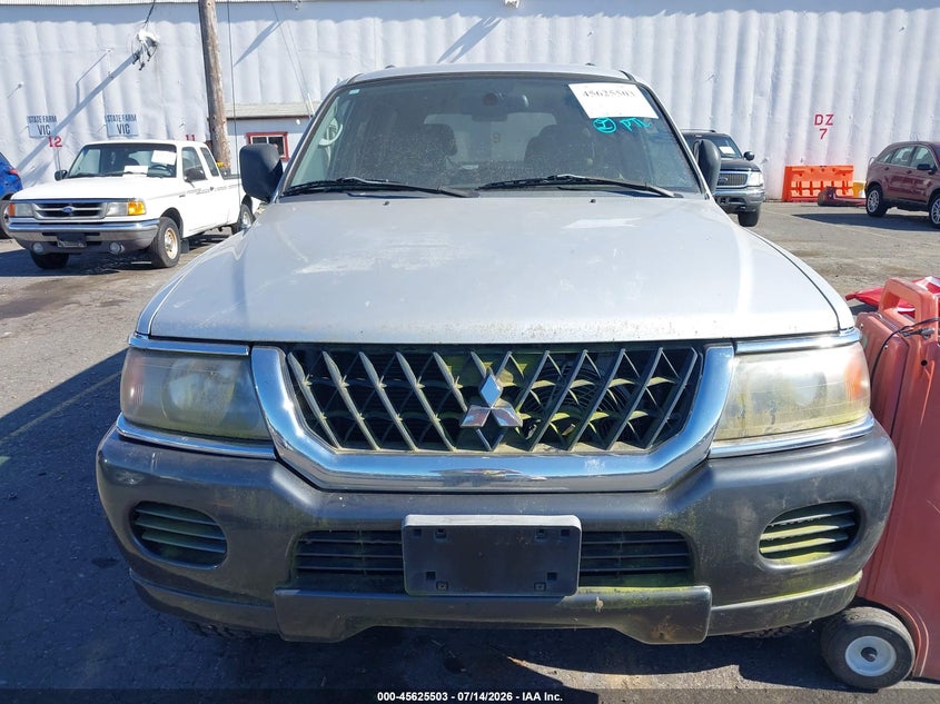 2002 Mitsubishi Montero VIN JA4MT31R32J057520 IAAI salvage auction — NORMAL WEAR, Clear - Public Restricted (Oregon), sold $275 on 2026-07-30 (photo 6)