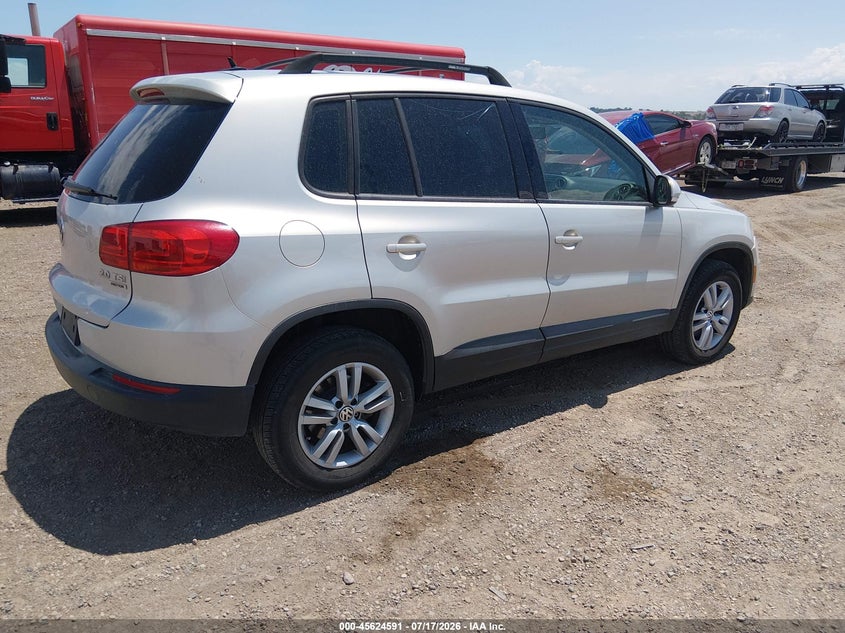 2013 Volkswagen Tiguan VIN WVGBV3AX1DW569736 IAAI salvage auction — NORMAL WEAR, Salvage Title, sold $50 on 2026-08-12 (photo 4)