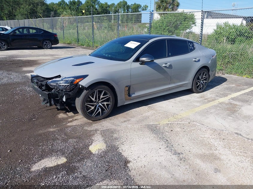 2023 Kia Stinger VIN KNAE35LD1P6136862 IAAI salvage auction — SIDE, Salvage Title, sold $4,950 on 2026-08-02 (photo 2)