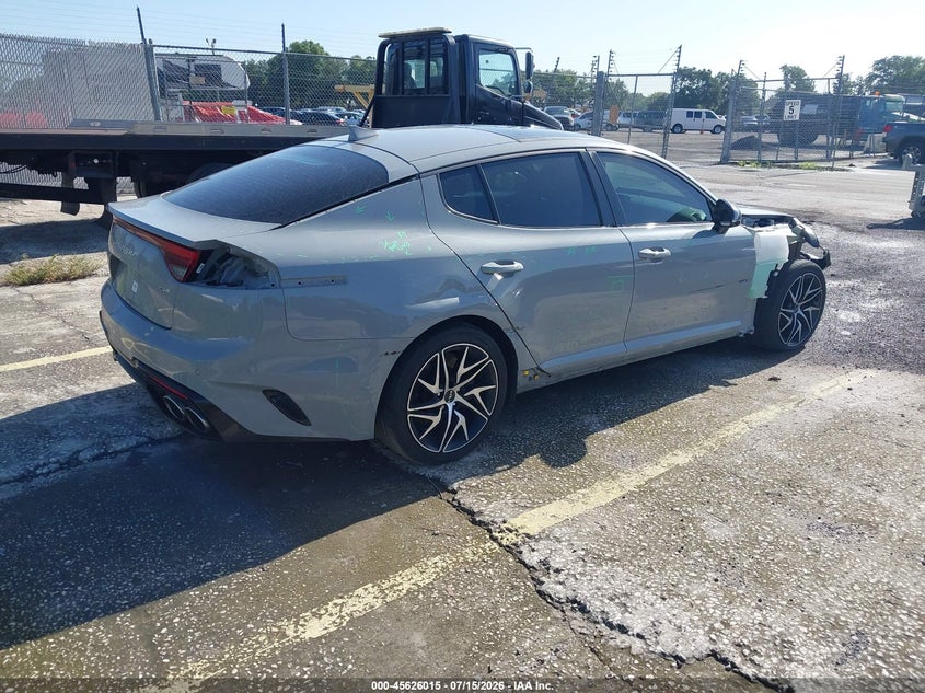2023 Kia Stinger VIN KNAE35LD1P6136862 IAAI salvage auction — SIDE, Salvage Title, sold $4,950 on 2026-08-02 (photo 4)