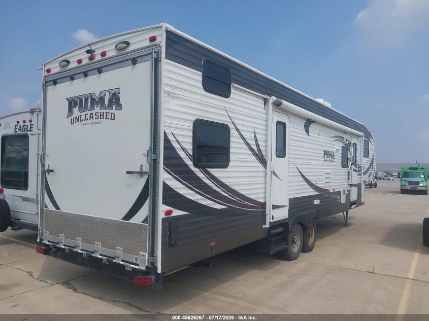 2013 Puma VIN 4X4FPTL22DP045291 IAAI salvage auction — SIDE, Salvage (Illinois), sold $2,050 on 2026-09-02 (photo 4)